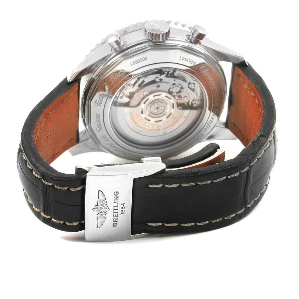 The image shows the back view of a Breitling Navitimer AB044121-BD24-442X-A20D.1 Men's Stainless Steel Black Dial AB044121-BD24-442X-A20D.1 Men's Stainless Steel Black Dial watch, featuring its case back and leather strap with a branded clasp.
