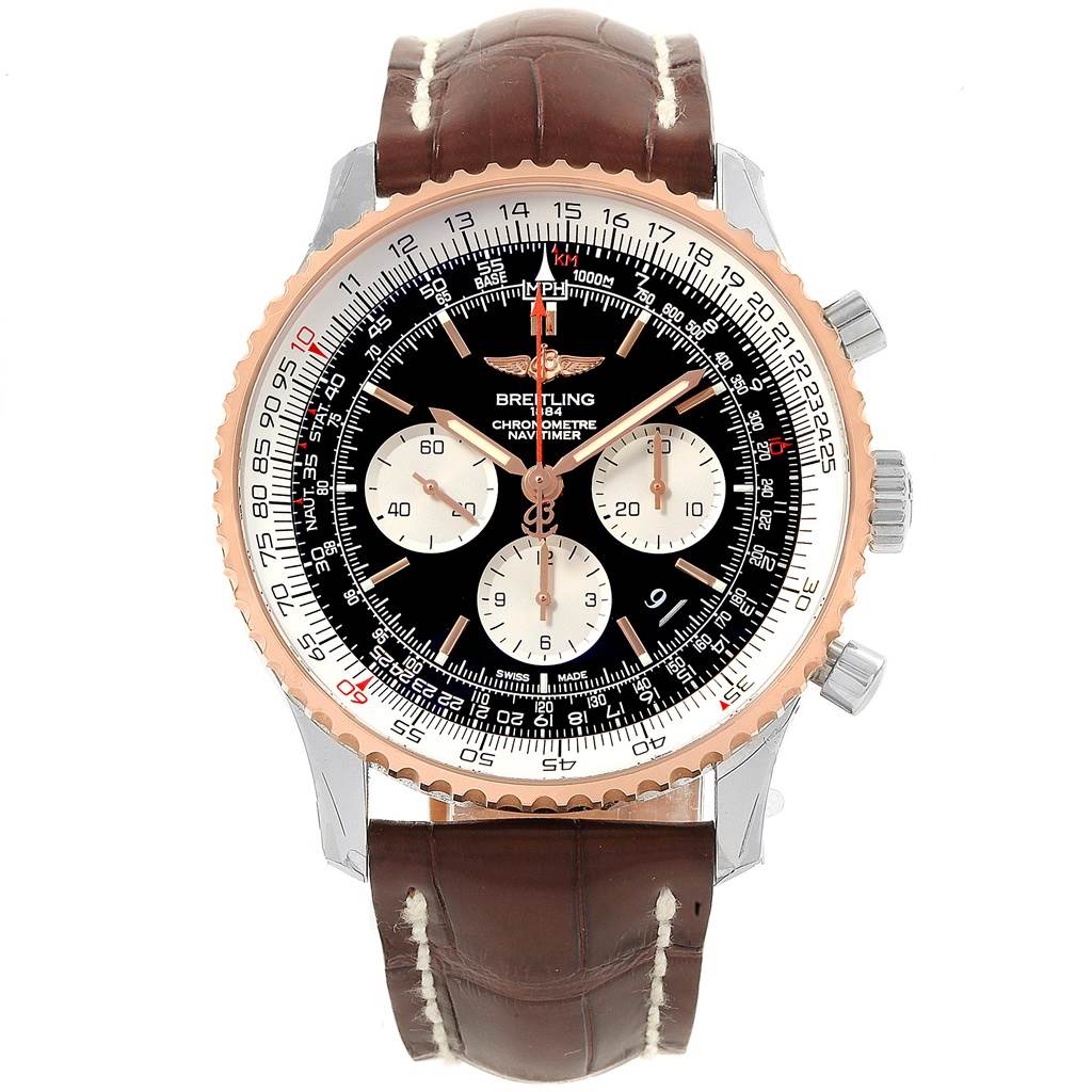 The image shows a front view of a Breitling Navitimer UB0127 Men
s Stainless Steel Black Dial UB0127 Men
s Stainless Steel Black Dial watch, featuring its dial, bezel, and brown leather strap.