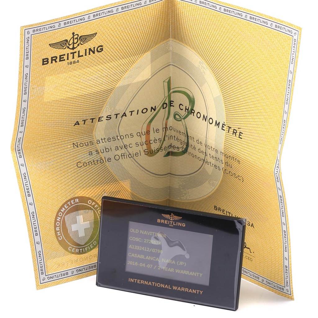 The image shows the international warranty card and the certificate of authenticity for a Breitling Navitimer A13324 Men's Stainless Steel Silver Dial A13324 Men's Stainless Steel Silver Dial watch.