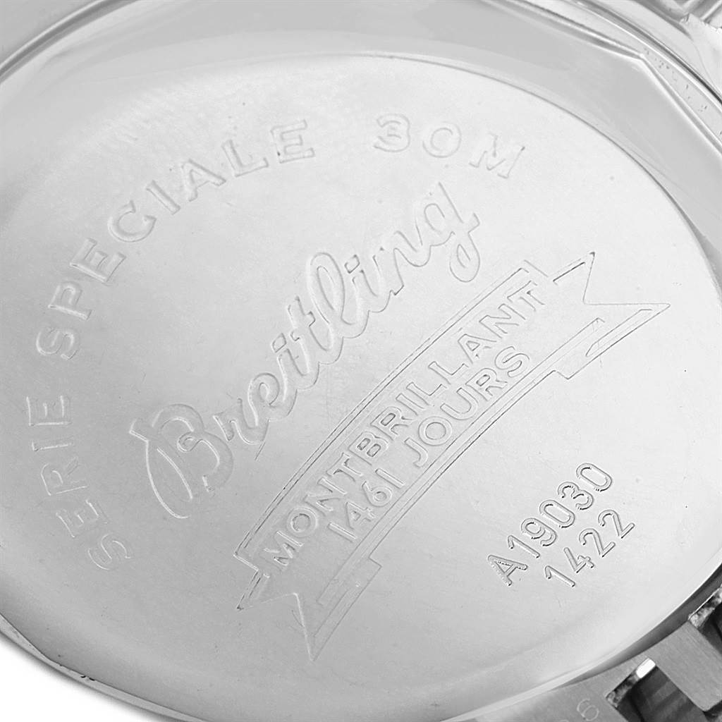 This image shows the engraved case back of a Breitling Navitimer A19030 Men's Stainless Steel Silver Dial A19030 Men's Stainless Steel Silver Dial Montbrillant watch, highlighting the model details and serial number.