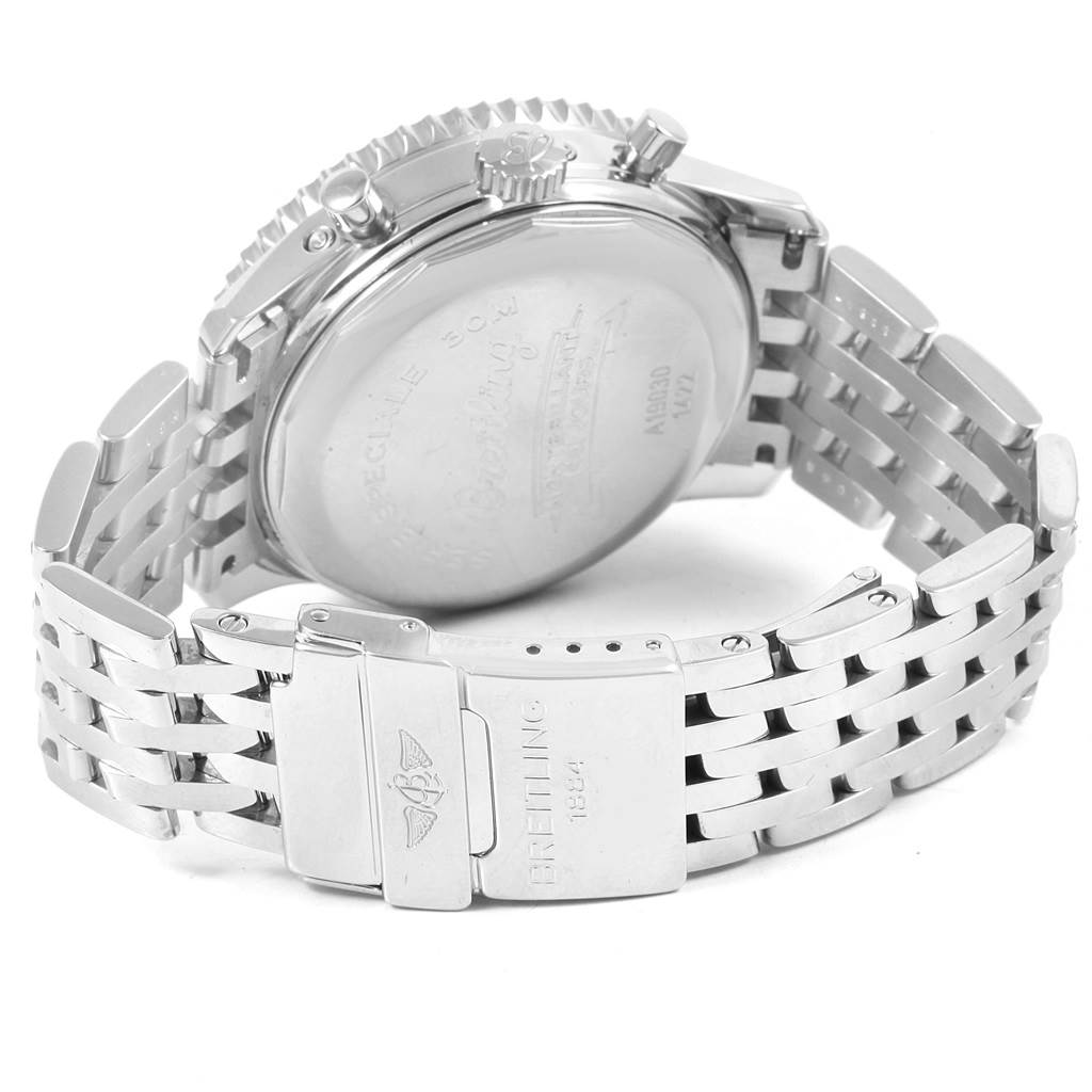 The image shows the back view of a Breitling Navitimer A19030 Men's Stainless Steel Silver Dial A19030 Men's Stainless Steel Silver Dial watch, highlighting its case back and metal bracelet with clasp.