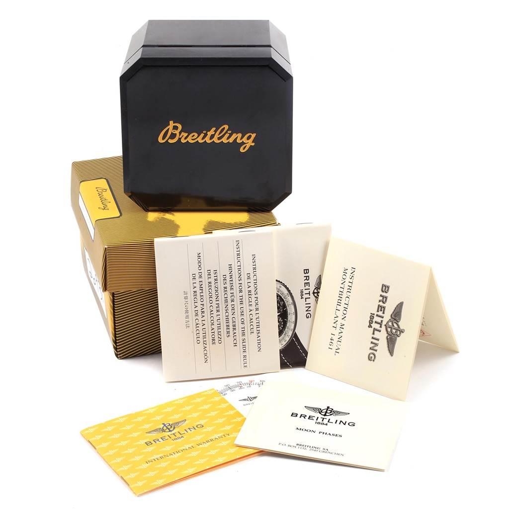 The image shows the packaging and documents for a Breitling Navitimer A19030 Men's Stainless Steel Silver Dial A19030 Men's Stainless Steel Silver Dial watch, including the box and instruction manuals.