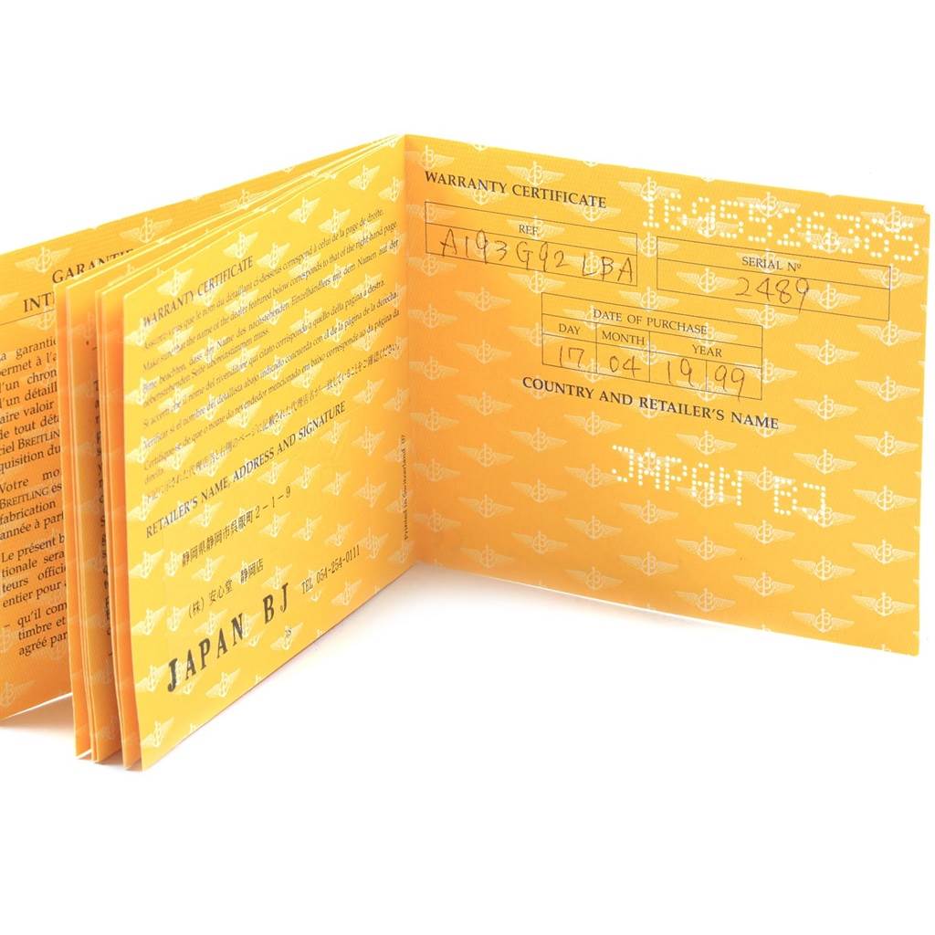 This image shows the open warranty certificate booklet for a Breitling Navitimer A19030 Men's Stainless Steel Silver Dial A19030 Men's Stainless Steel Silver Dial watch, displaying purchase details and retailer information.