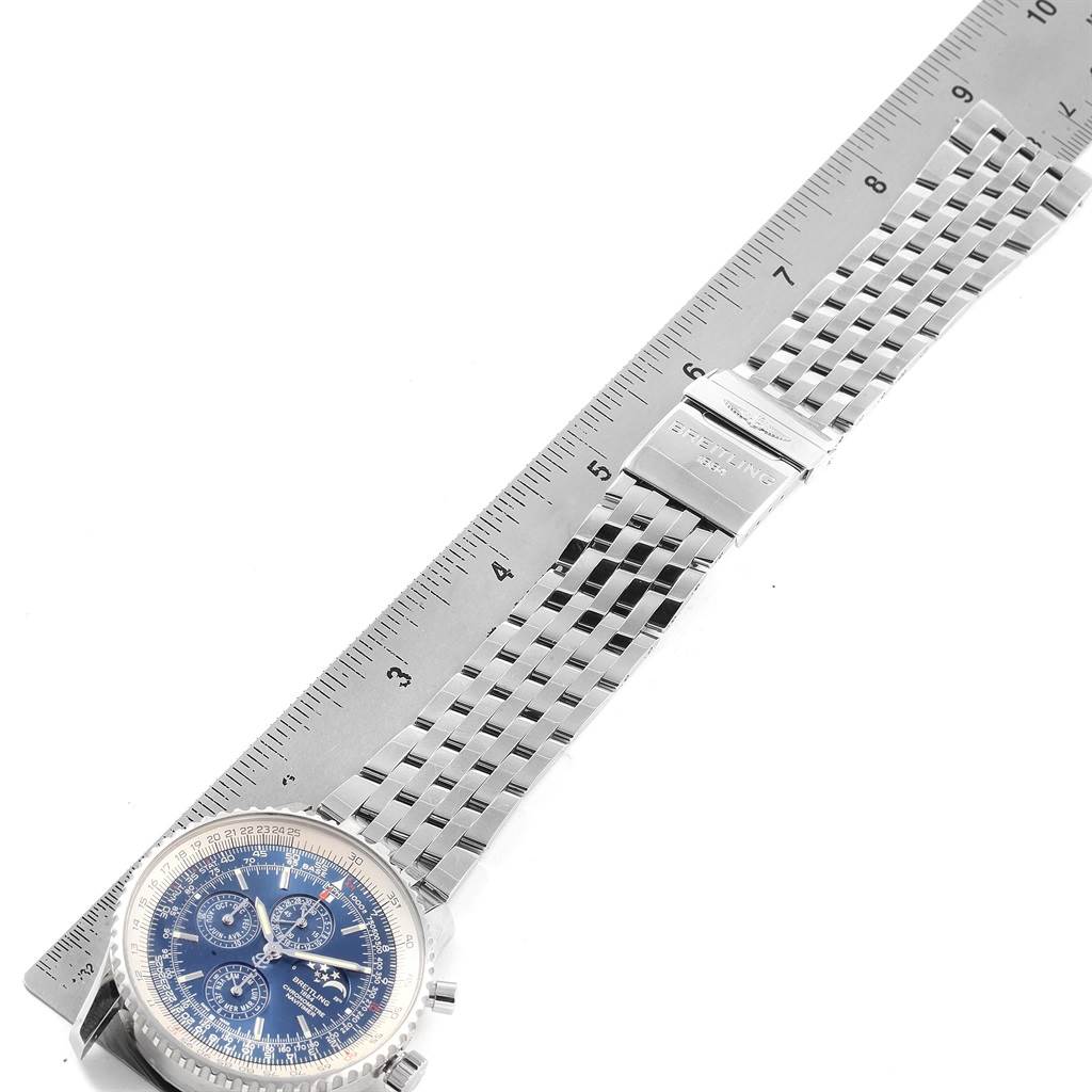 The image shows the Breitling Navitimer A19370 Men's Stainless Steel Blue Dial A19370 Men's Stainless Steel Blue Dial watch lying flat with its face, metal band, and clasp visible next to a ruler.