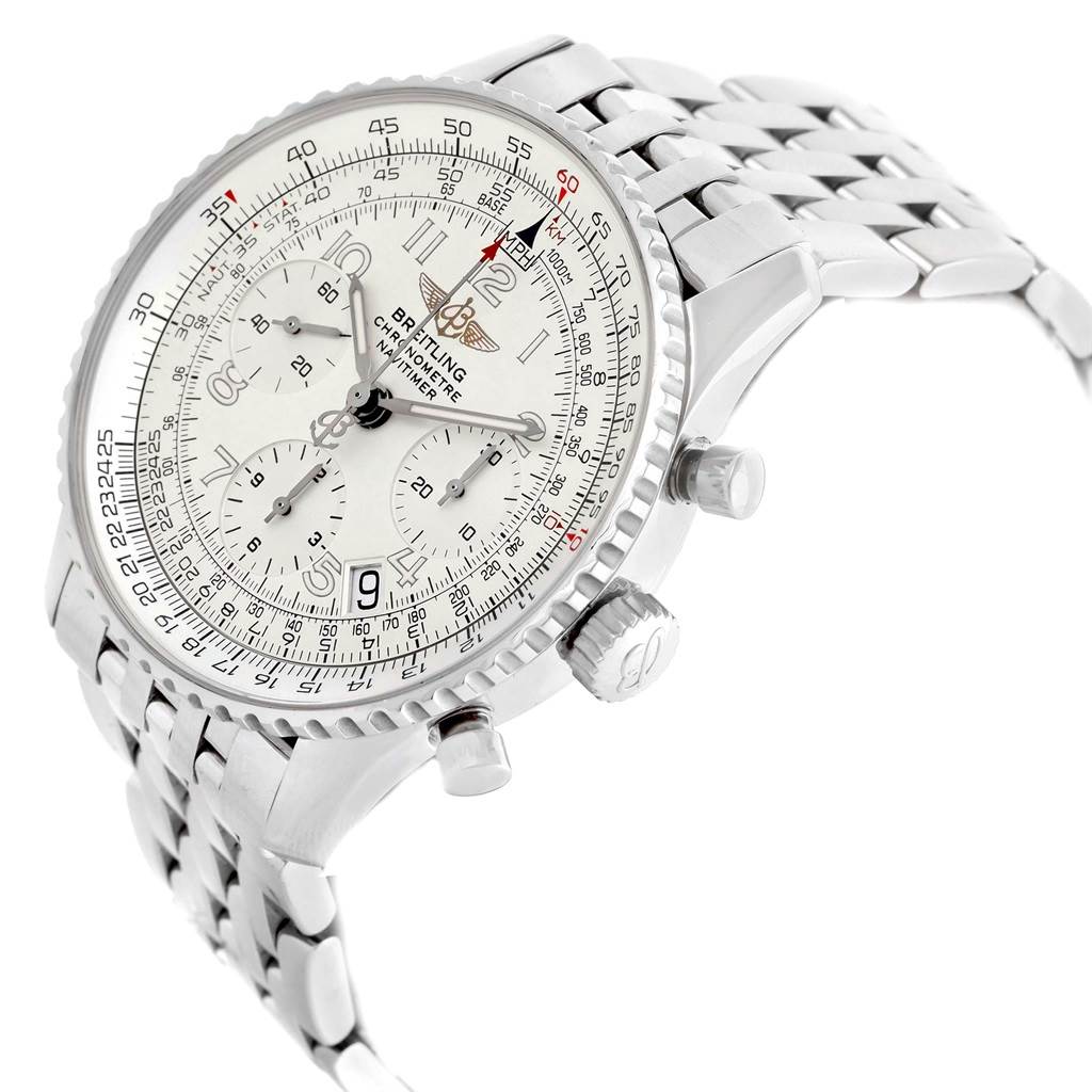 The image shows a side angle of a Breitling Navitimer A23322 Men
s Stainless Steel Silver Dial A23322 Men
s Stainless Steel Silver Dial watch, highlighting its dial, case, crown, pushers, and metal bracelet.