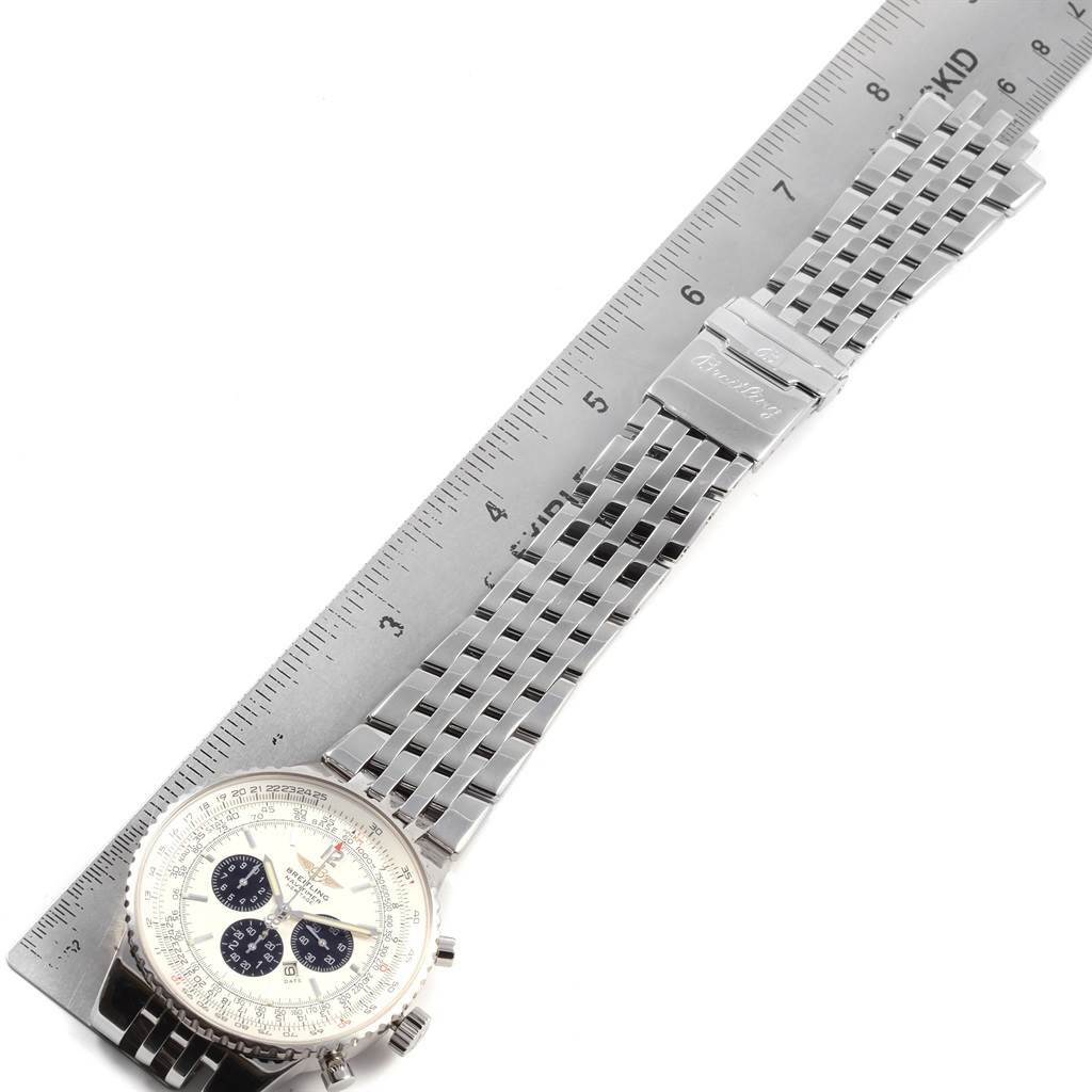 The image shows a Breitling Navitimer A35350 Men
s Stainless Steel Silver Dial A35350 Men
s Stainless Steel Silver Dial watch at an angle, featuring its stainless steel bracelet, dial, and clasp.