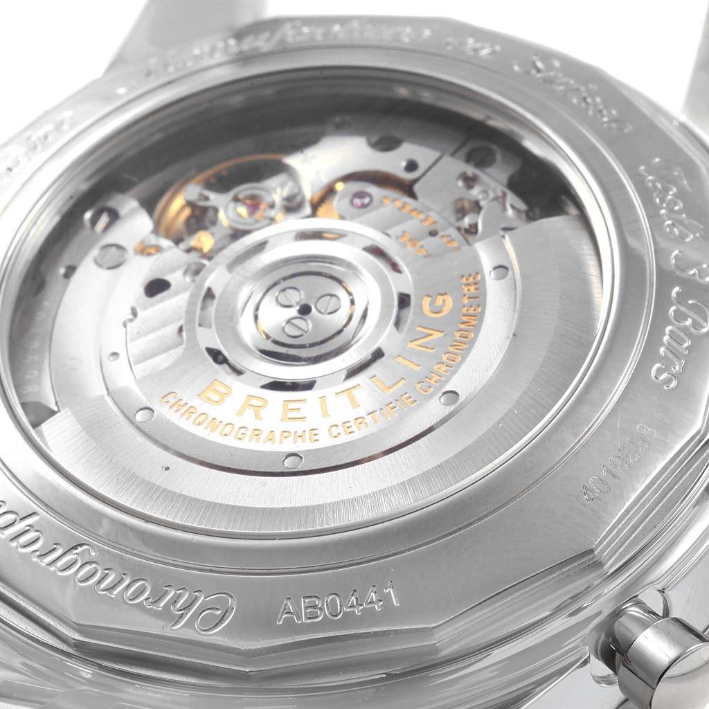 This image shows the back view of a Breitling Navitimer AB044121-G783-453A Men's Stainless Steel Silver Dial AB044121-G783-453A Men's Stainless Steel Silver Dial watch, revealing its inner mechanical movement with engravings.