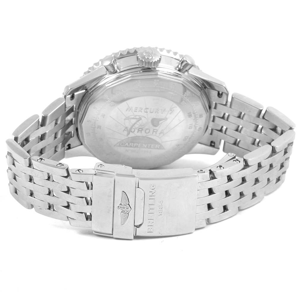 The image shows the back view of a Breitling Navitimer AB0210 Men's Stainless Steel Black Dial AB0210 Men's Stainless Steel Black Dial watch, highlighting the engraved case back and metal bracelet with clasp.