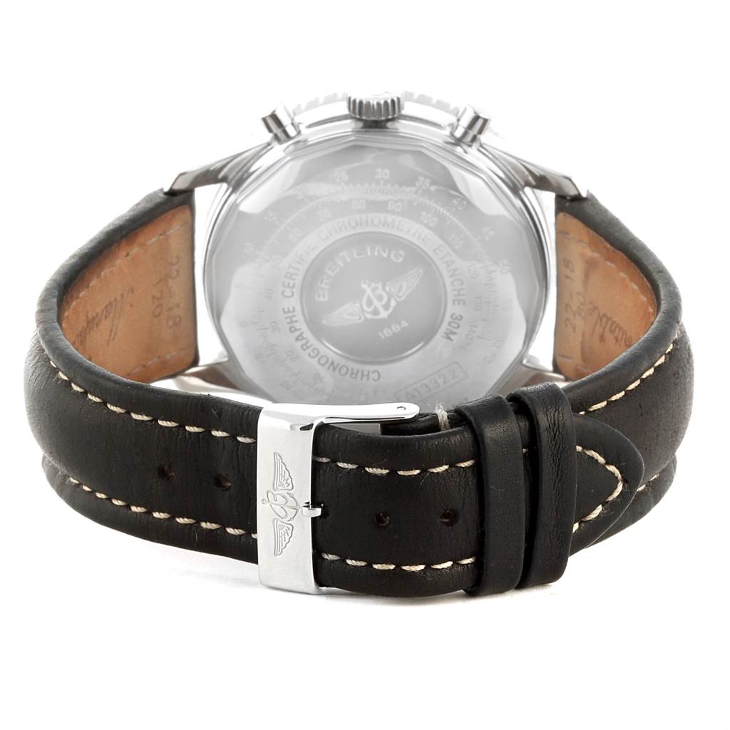 The image shows the back view of the Breitling Navitimer A13322 Men
s Stainless Steel Black Dial A13322 Men
s Stainless Steel Black Dial watch, highlighting its case back, black leather strap, and buckle.