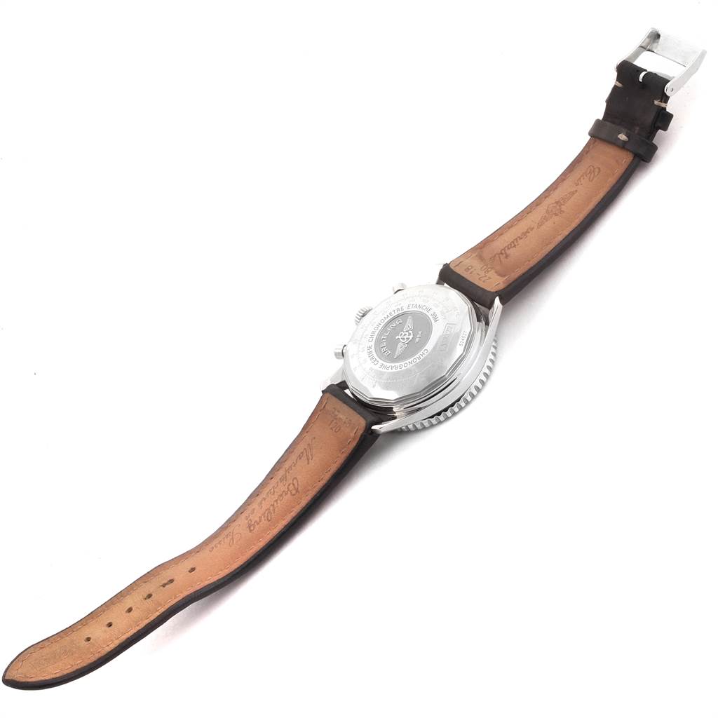 The image shows the back view of a Breitling Navitimer A13322 Men
s Stainless Steel Black Dial A13322 Men
s Stainless Steel Black Dial watch, focusing on its case back and leather strap.