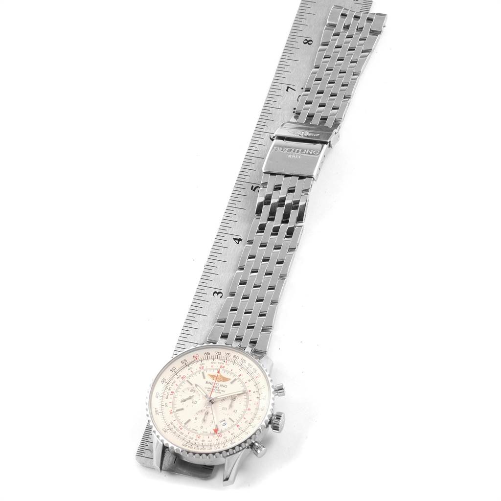 The image shows a Breitling Navitimer AB044121-G783-453A Men's Stainless Steel Silver Dial AB044121-G783-453A Men's Stainless Steel Silver Dial watch laid flat with a metal band and a ruler for scale.