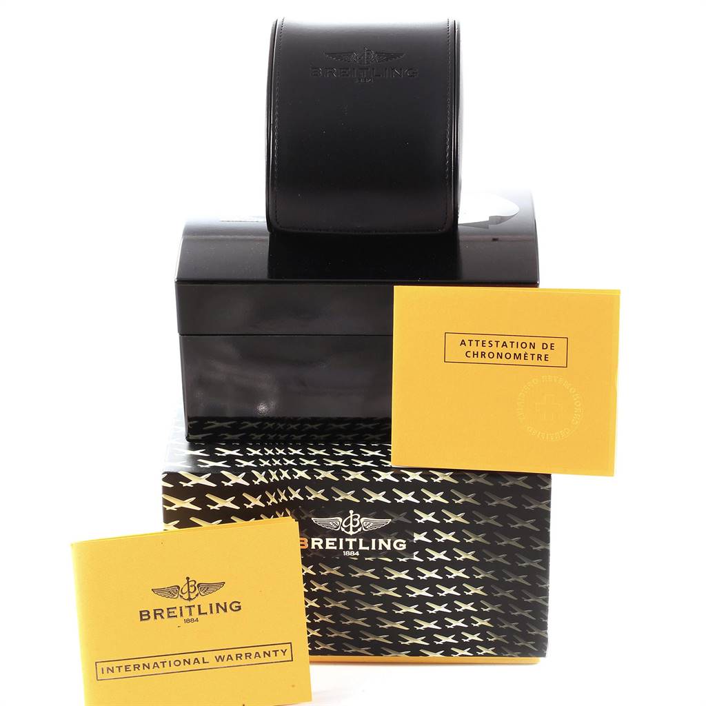 The image shows the box and accessories, including warranty and certification books, for a Breitling Navitimer AB0131 Men's Stainless Steel Silver Dial AB0131 Men's Stainless Steel Silver Dial watch.