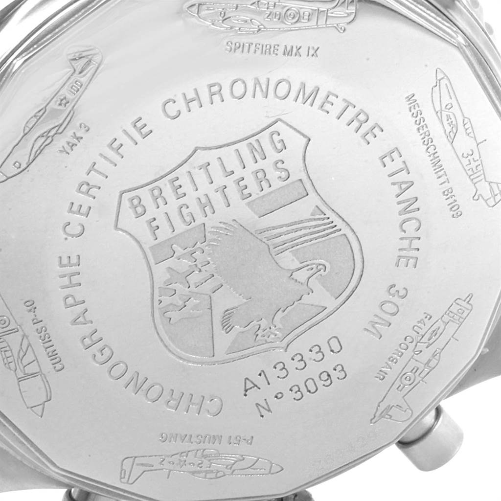The image shows the engraved case back of a Breitling Navitimer A13330 Men's Stainless Steel Silver Dial A13330 Men's Stainless Steel Silver Dial watch, featuring aircraft illustrations and text.