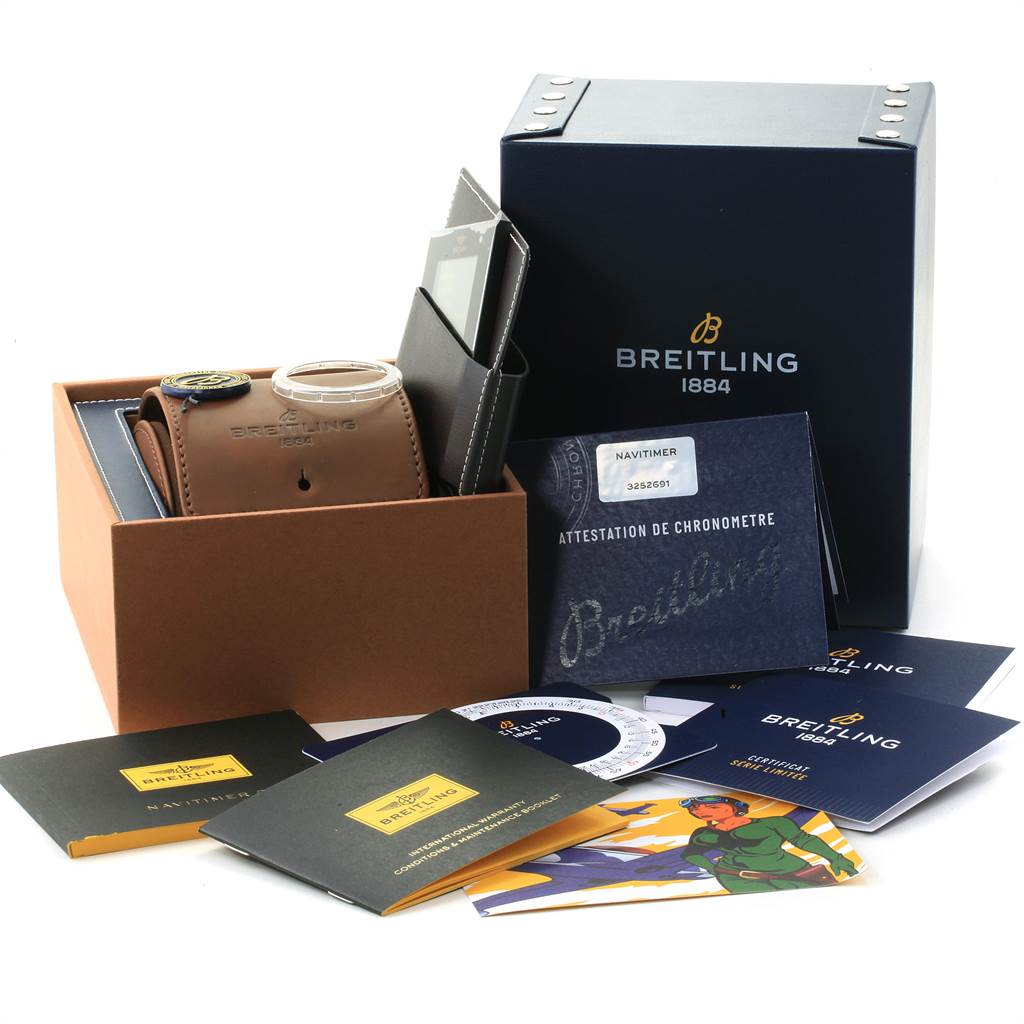 The image shows a Breitling Navitimer AB0121 Men
s Stainless Steel Blue Dial AB0121 Men
s Stainless Steel Blue Dial watch packaging, documentation, a leather case, and various accessories from an above angle.
