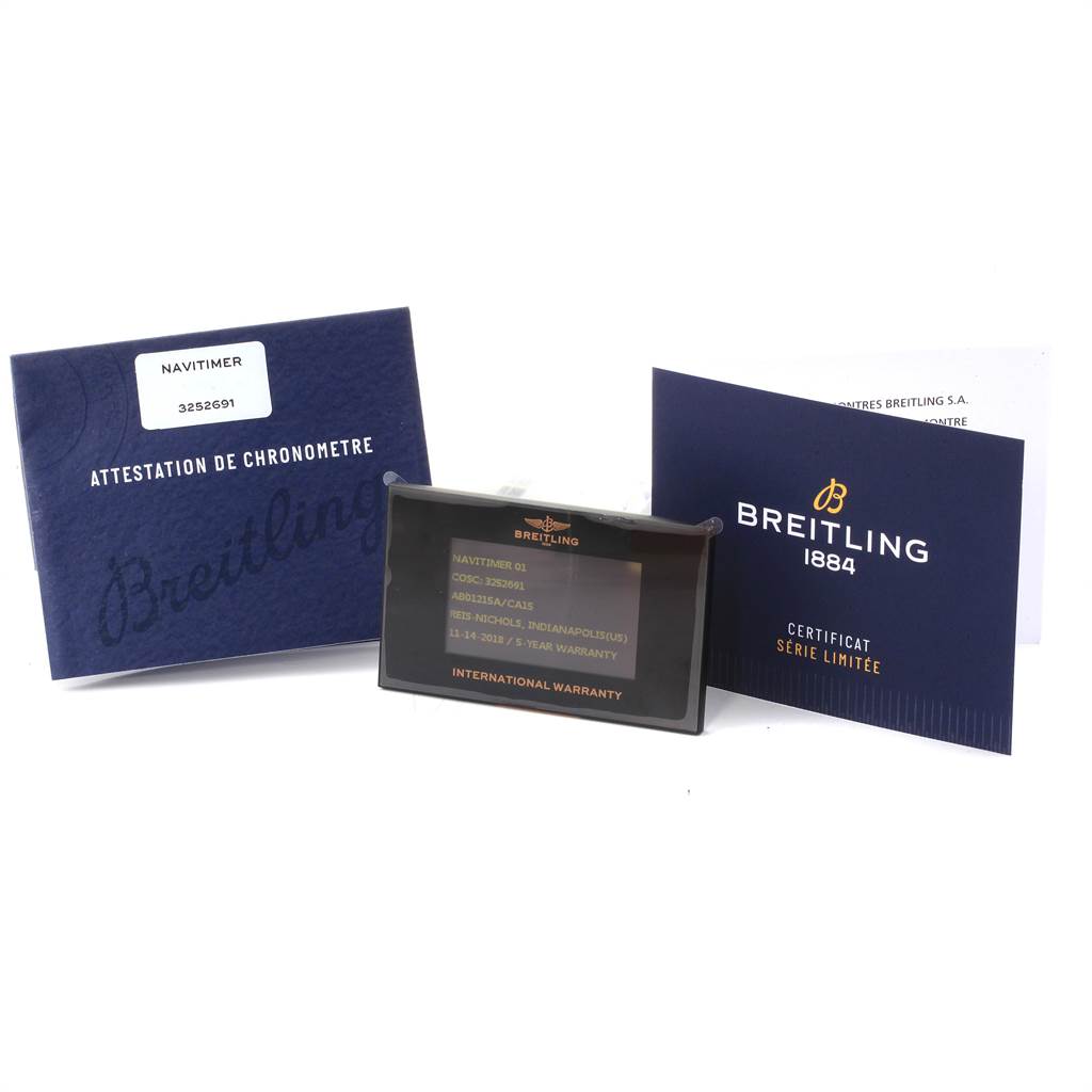 The image shows the warranty card and accompanying documentation for the Breitling Navitimer AB0121 Men
s Stainless Steel Blue Dial AB0121 Men
s Stainless Steel Blue Dial model.