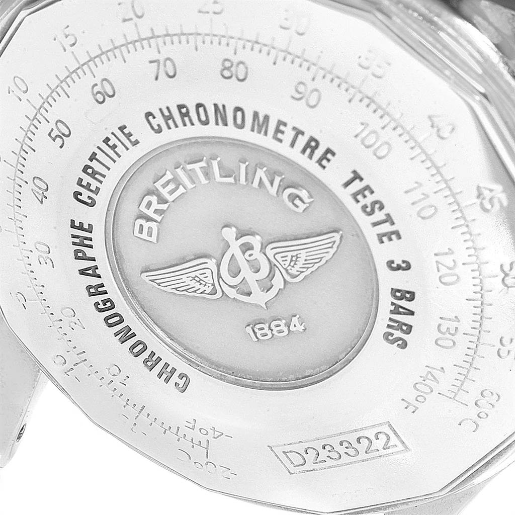 The image shows a close-up of the back case of a Breitling Navitimer D23322 Men's Stainless Steel Silver Dial D23322 Men's Stainless Steel Silver Dial watch, highlighting the engravings and model number.