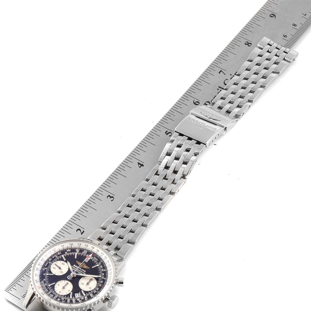 The image shows a full view of a Breitling Navitimer A23322 Men's Stainless Steel Black Dial A23322 Men's Stainless Steel Black Dial watch laid flat alongside a ruler.