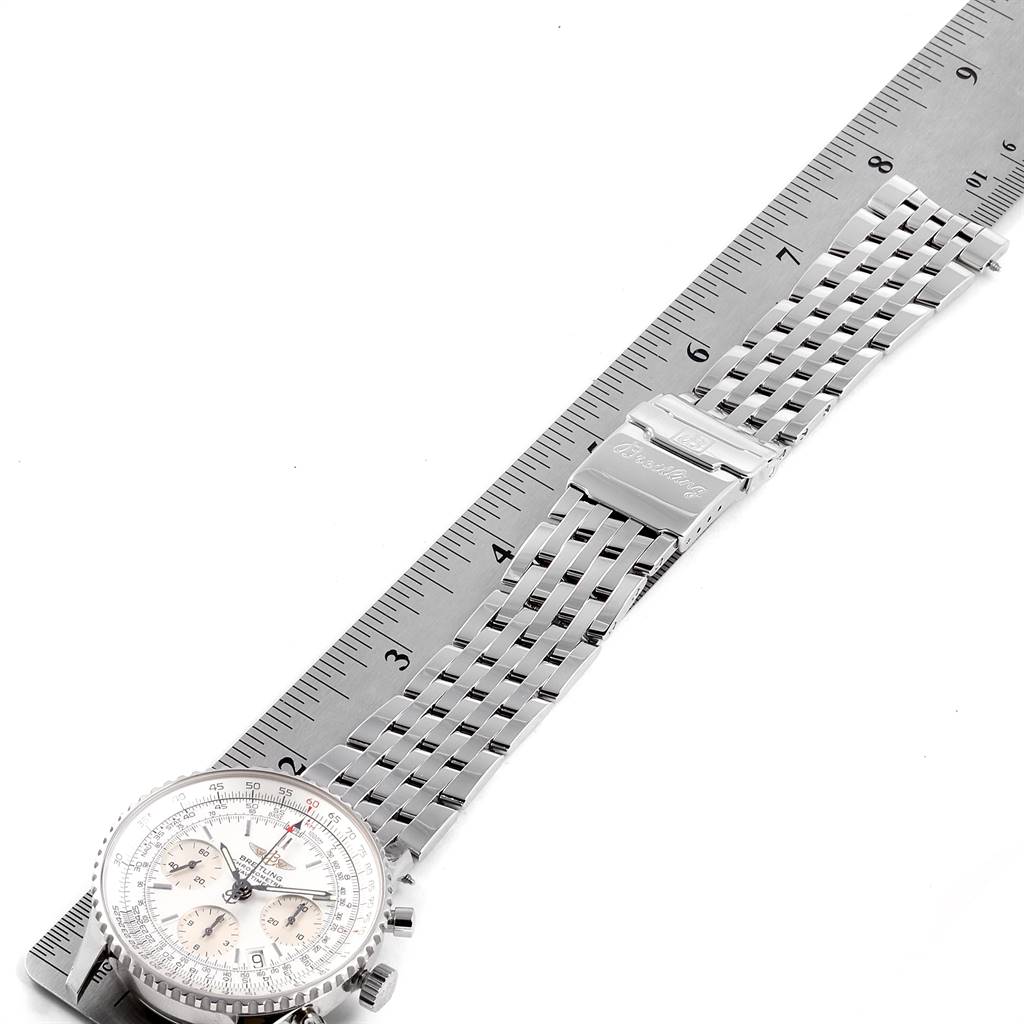 The image shows a top view of a Breitling Navitimer A23322 Men's Stainless Steel Silver Dial A23322 Men's Stainless Steel Silver Dial watch, featuring its face and metal bracelet measured against a ruler.