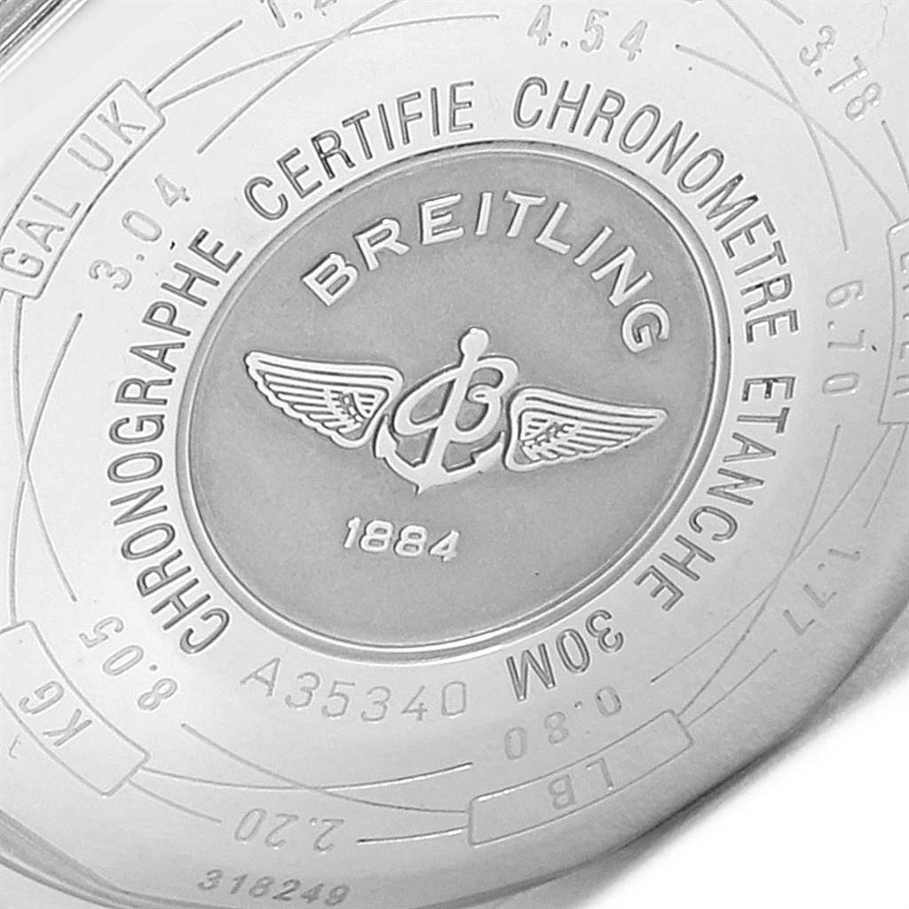 The image shows the back case of a Breitling Navitimer A35340 Men
s Stainless Steel Blue Dial A35340 Men
s Stainless Steel Blue Dial watch, highlighting the brand logo and engraved details.