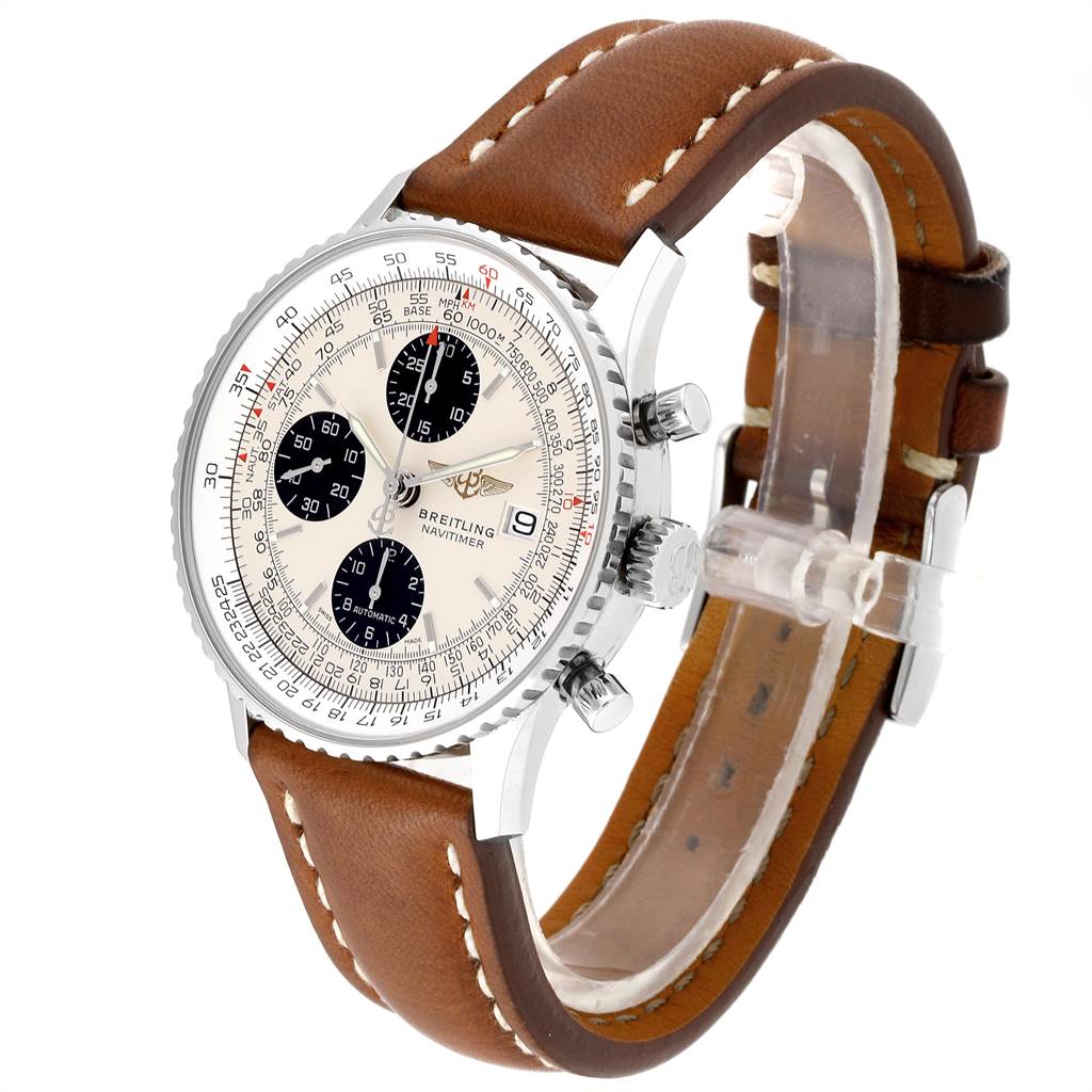 The Breitling Navitimer A13324 Men's Stainless Steel Silver Dial A13324 Men's Stainless Steel Silver Dial watch is shown at a three-quarter angle, highlighting its face, bezel, crown, pushers, and brown leather strap.