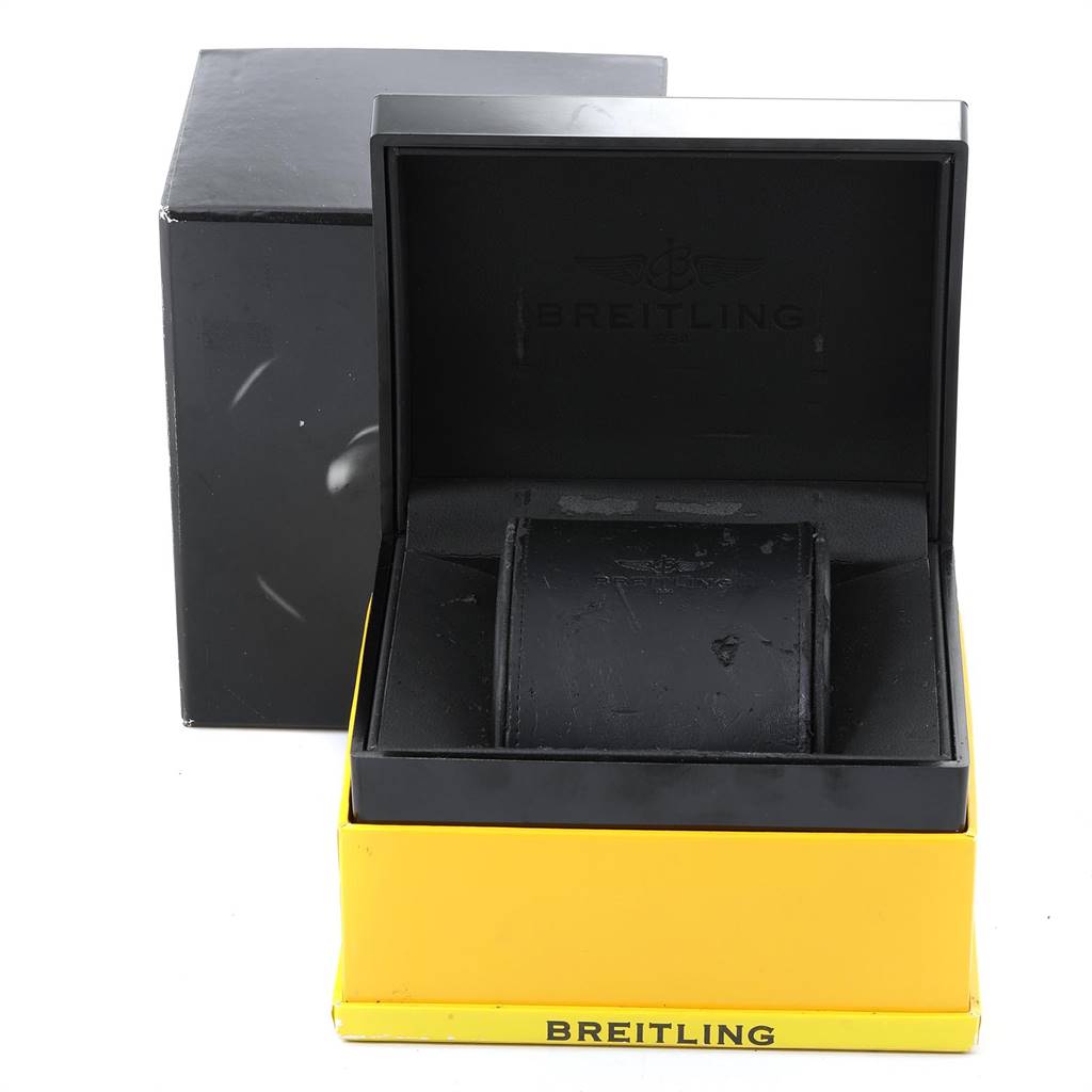 The image shows an empty black and yellow Breitling Navitimer D12022 Men's Stainless Steel Blue Dial D12022 Men's Stainless Steel Blue Dial watch box, viewed from the front with the lid open.