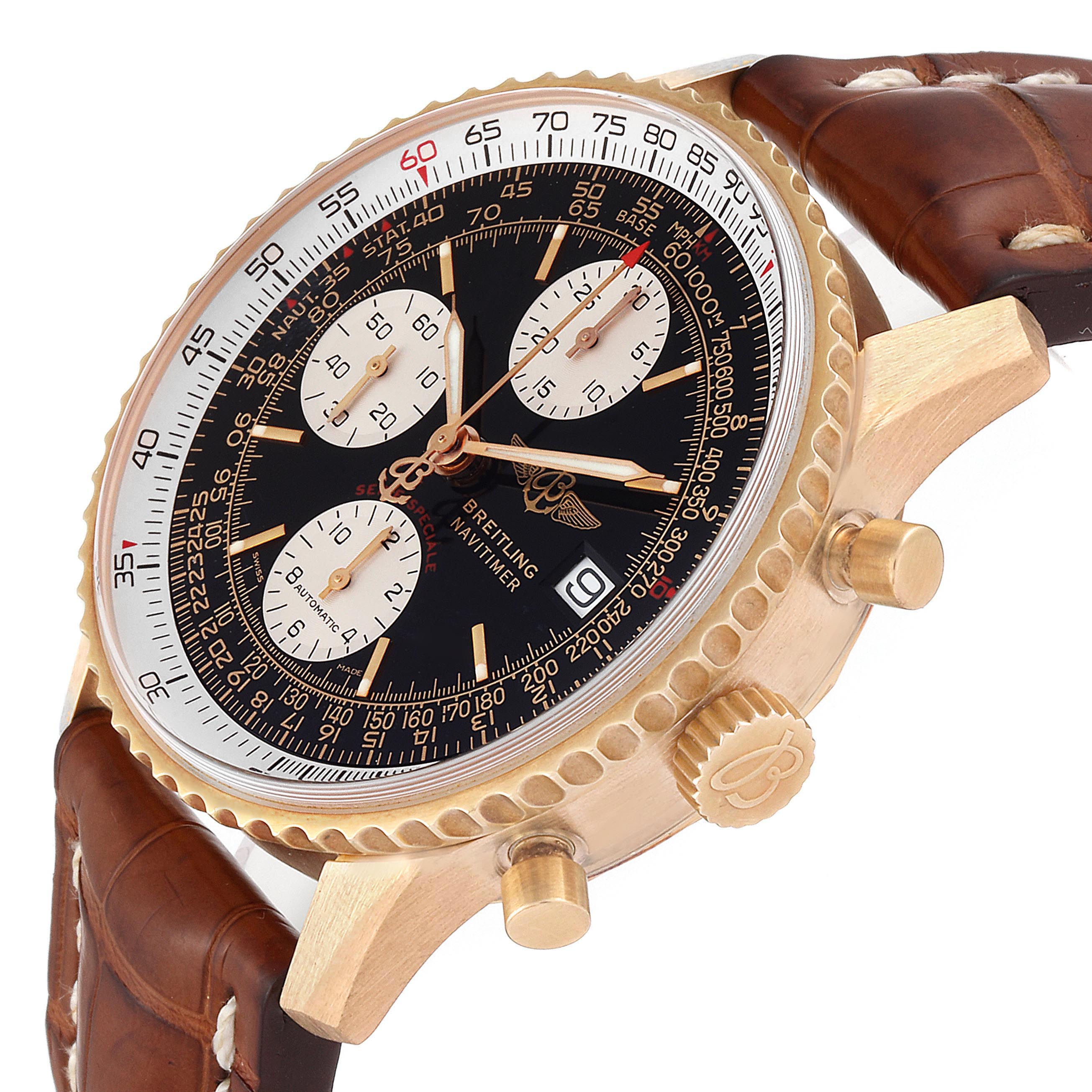 The Breitling Navitimer H13330 Men's Yellow Gold Black Dial H13330 Men's Yellow Gold Black Dial watch is shown at an angle displaying the face, bezel, pushers, crown, and part of the leather strap.