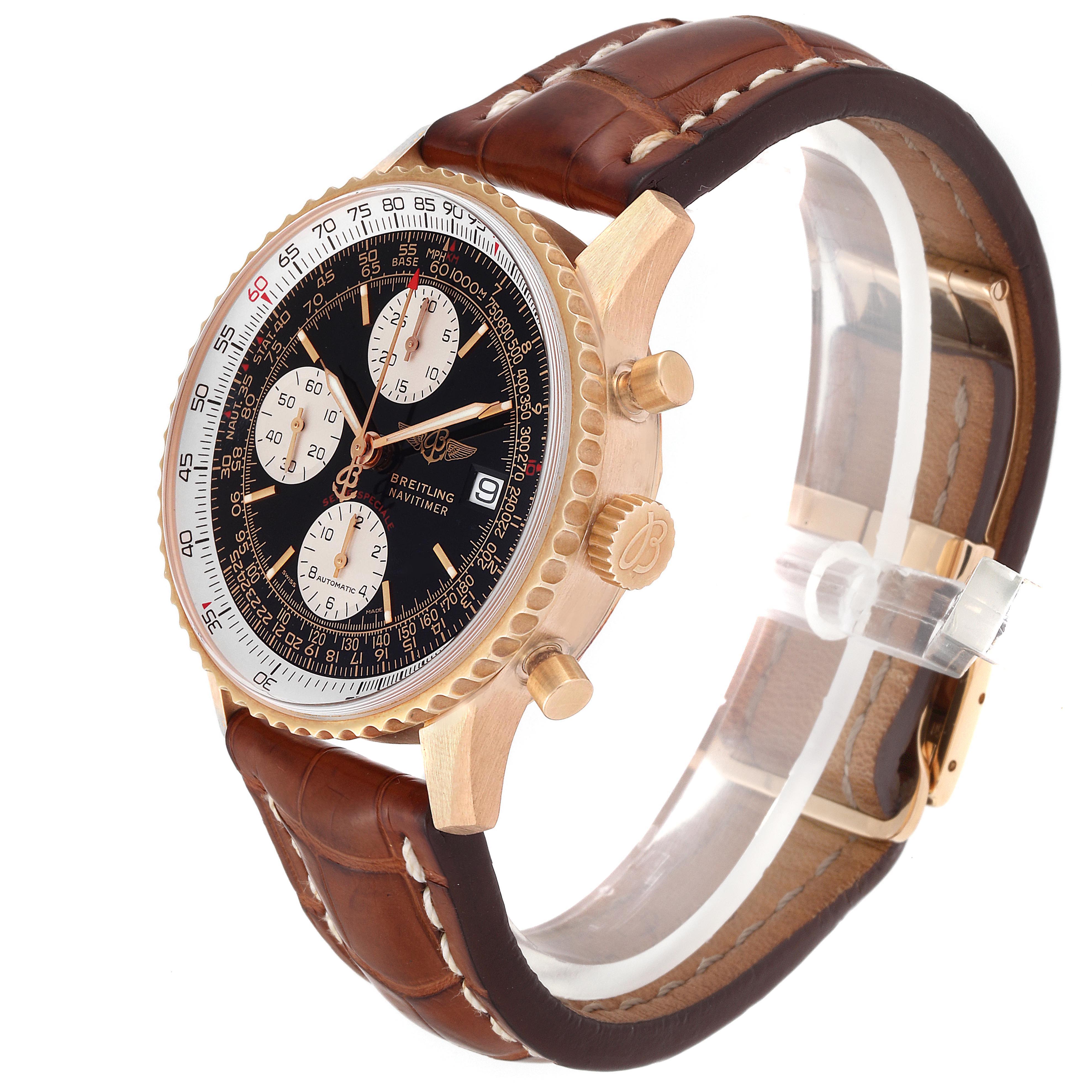 The Breitling Navitimer H13330 Men's Yellow Gold Black Dial H13330 Men's Yellow Gold Black Dial watch is shown at a three-quarter angle, displaying its brown leather strap, gold case, and detailed dial.