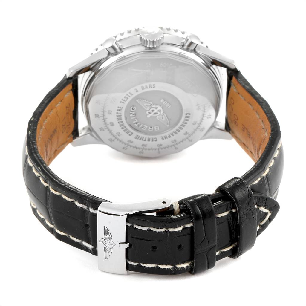 The image shows the back view of a Breitling Navitimer A23322 Men
s Stainless Steel Black Dial A23322 Men
s Stainless Steel Black Dial watch, highlighting its leather strap and metal buckle.