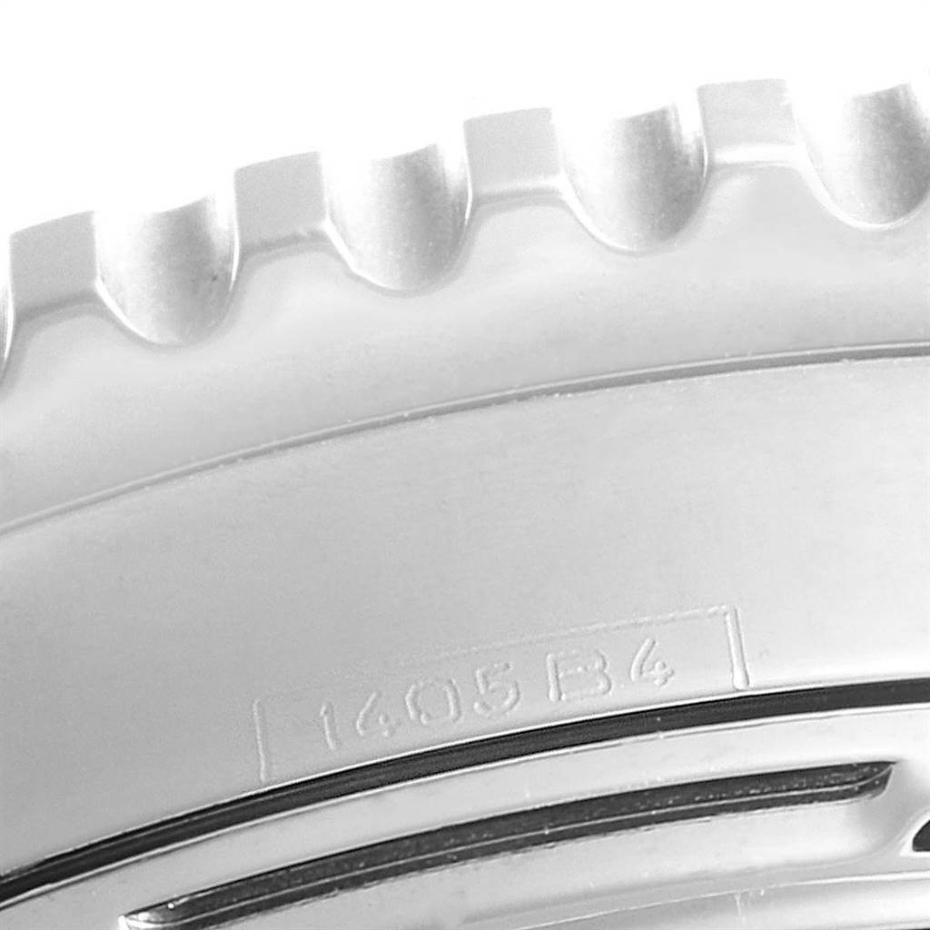 This image shows a close-up of the bezel and edge, including the engraved model number of a Breitling Navitimer A23322 Men
s Stainless Steel Blue Dial A23322 Men
s Stainless Steel Blue Dial watch.