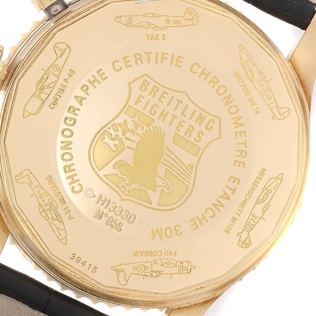 A close-up of the back of a Breitling Navitimer H13330 Men's Yellow Gold Black Dial H13330 Men's Yellow Gold Black Dial watch, showing the engraving and stamped models.