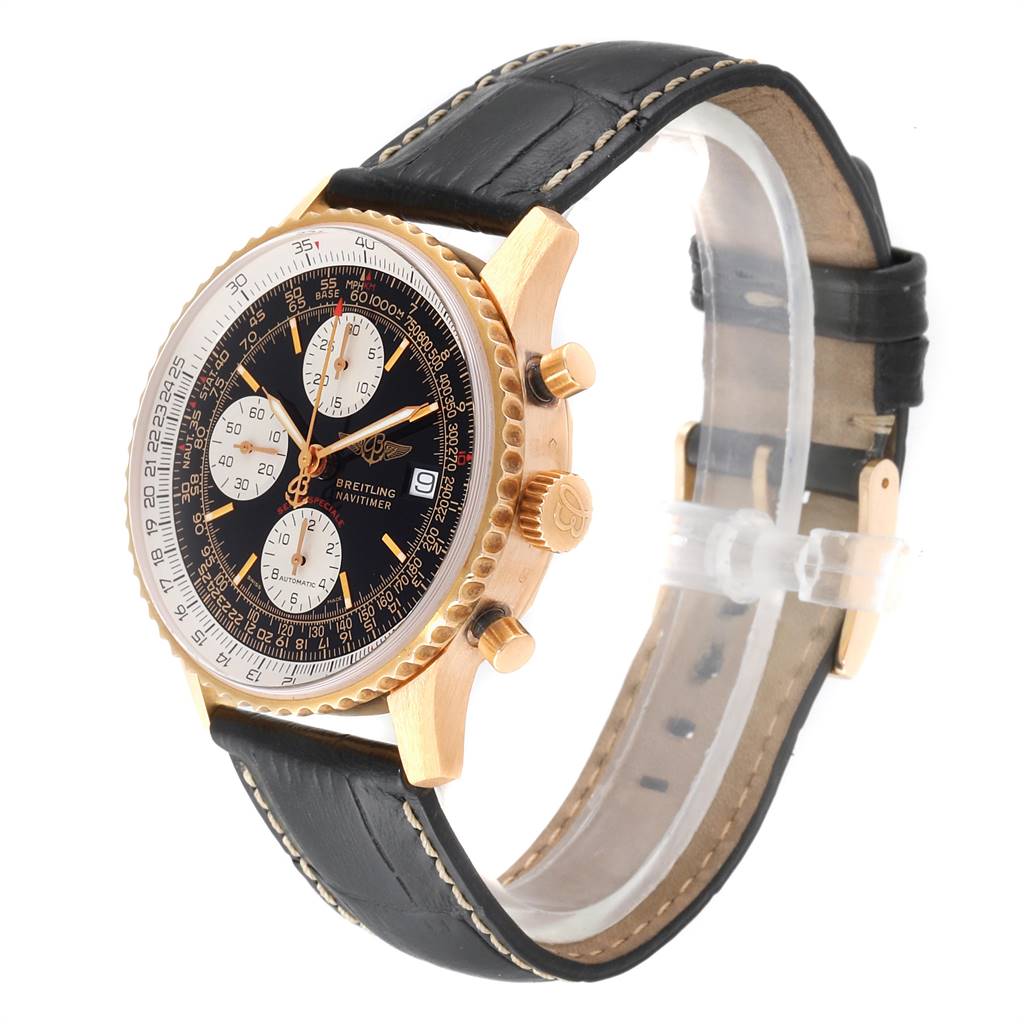 The image shows a Breitling Navitimer H13330 Men's Yellow Gold Black Dial H13330 Men's Yellow Gold Black Dial watch at a three-quarter angle highlighting the face, bezel, pushers, and leather strap.