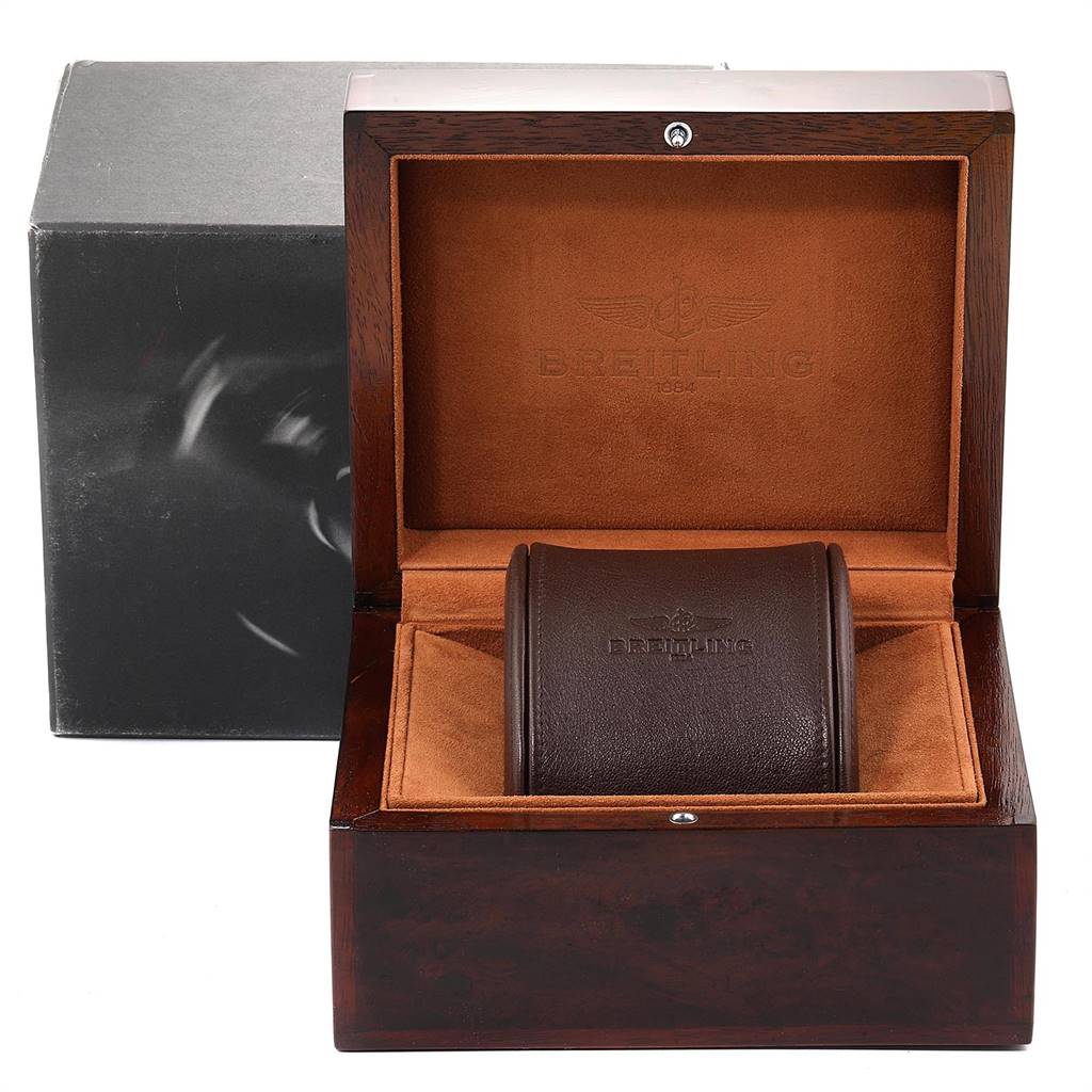 The image shows the opened wooden box and leather holder for a Breitling Navitimer H13330 Men's Yellow Gold Black Dial H13330 Men's Yellow Gold Black Dial watch.