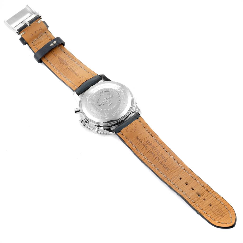 The image shows the back of a Breitling Navitimer A13324 Men's Stainless Steel Blue Dial A13324 Men's Stainless Steel Blue Dial watch with its leather strap fully extended.