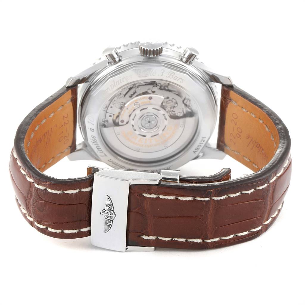 The image shows the back angle of a Breitling Navitimer AB0121C4-Q605-739P-A20BA.1 Men's Stainless Steel Brown Dial AB0121C4-Q605-739P-A20BA.1 Men's Stainless Steel Brown Dial watch, highlighting its open case back and brown leather strap with a clasp.