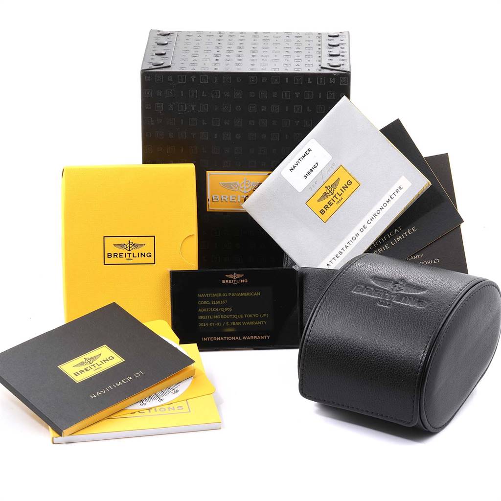 The image shows the packaging and accessories for the Breitling Navitimer AB0121C4-Q605-739P-A20BA.1 Men's Stainless Steel Brown Dial AB0121C4-Q605-739P-A20BA.1 Men's Stainless Steel Brown Dial watch, including a box, manuals, warranty card, and carrying case.