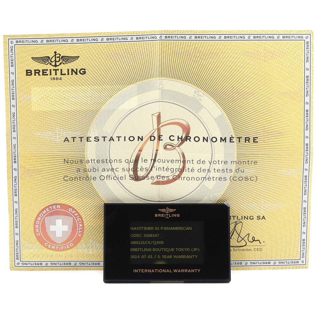 The image shows the international warranty card and chronometer certification for the Breitling Navitimer AB0121C4-Q605-739P-A20BA.1 Men's Stainless Steel Brown Dial AB0121C4-Q605-739P-A20BA.1 Men's Stainless Steel Brown Dial model, displayed from a front angle.