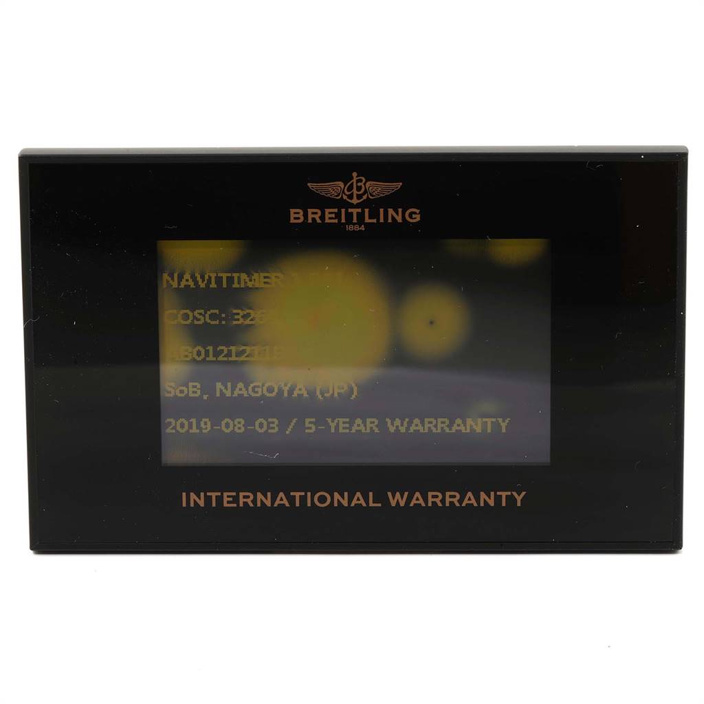 The image shows the warranty card for the Breitling Navitimer AB0121 Men
s Stainless Steel Black Dial AB0121 Men
s Stainless Steel Black Dial watch, detailing the model
s information and warranty period.