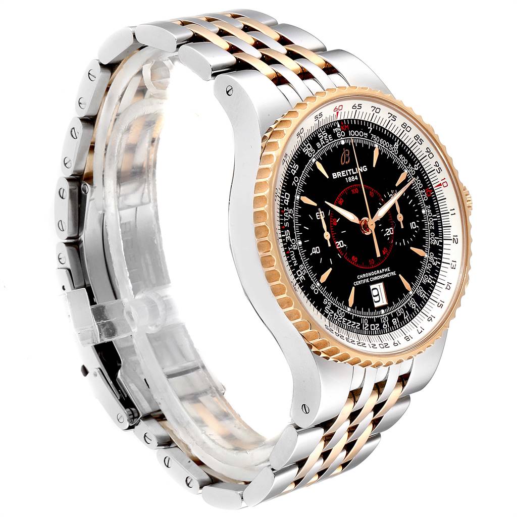 The Breitling Navitimer C23340 Men
s Steel and Gold (two tone) Black Dial C23340 Men
s Steel and Gold (two tone) Black Dial watch is shown at an angle displaying the dial, bezel, and two-tone metal bracelet.