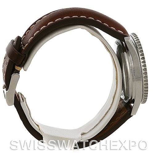 The image shows a side view of a Breitling Navitimer A4137012/B875 Men's Stainless Steel Black Dial A4137012/B875 Men's Stainless Steel Black Dial watch, featuring its case, bezel, and brown leather strap.