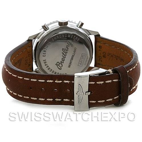 The image shows the back angle of a Breitling Navitimer A4137012/B875 Men's Stainless Steel Black Dial A4137012/B875 Men's Stainless Steel Black Dial watch, highlighting its case back and brown leather strap with white stitching.