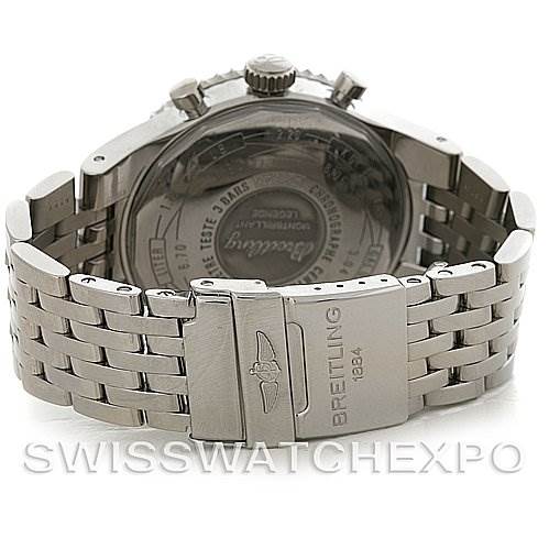 The image shows the back case and bracelet clasp of a Breitling Navitimer A23340 Men's Stainless Steel Black Dial A23340 Men's Stainless Steel Black Dial watch, highlighting its metal bracelet and engraved case back.