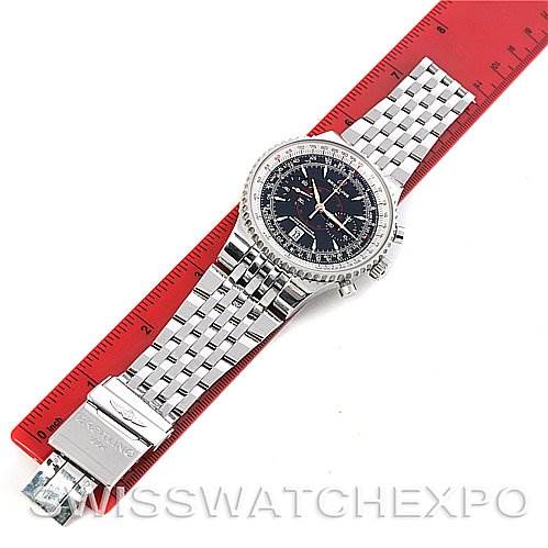 The image shows a top-down view of a Breitling Navitimer A23340 Men's Stainless Steel Black Dial A23340 Men's Stainless Steel Black Dial watch with a stainless steel bracelet and clasp, placed next to a red ruler.