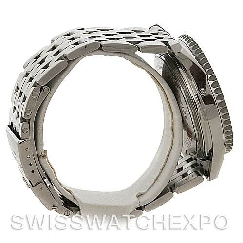 This image shows a side view of the Breitling Navitimer A2133012/B571 Men's Stainless Steel Black Dial A2133012/B571 Men's Stainless Steel Black Dial watch, highlighting the metal bracelet and case.