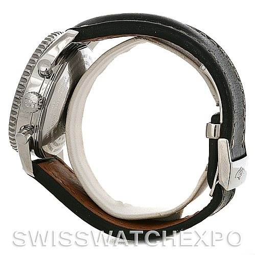 This image shows a side profile of a Breitling Navitimer A24322 Men
s Stainless Steel Black Dial A24322 Men
s Stainless Steel Black Dial watch focusing on the case, bezel, crown, and leather strap with a buckle.