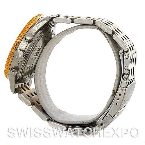 The image shows the side view of a Breitling Navitimer D23322 Men
s Stainless Steel Silver Dial D23322 Men
s Stainless Steel Silver Dial watch, highlighting the case, bezel, and metal bracelet.