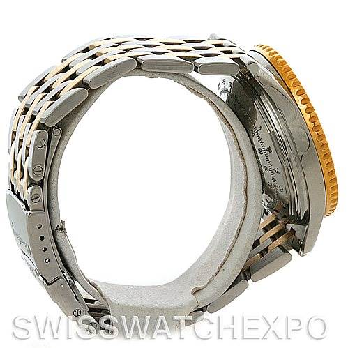 This image shows a side view of a Breitling Navitimer D23322 Men
s Stainless Steel Silver Dial D23322 Men
s Stainless Steel Silver Dial watch highlighting its bracelet and partially visible case and bezel.