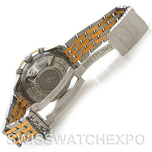 The image shows the backside of a Breitling Navitimer D23322 Men
s Stainless Steel Silver Dial D23322 Men
s Stainless Steel Silver Dial watch, highlighting the case back and part of the metal bracelet with the Breitling logo.