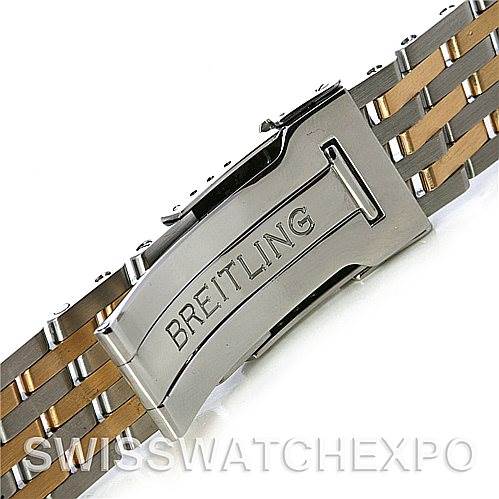 The image shows a close-up of the clasp and bracelet of a Breitling Navitimer D23322 Men
s Stainless Steel Silver Dial D23322 Men
s Stainless Steel Silver Dial watch.