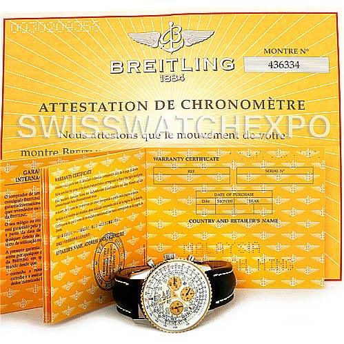 The image shows a Breitling Navitimer D22322 Men
s Stainless Steel White Dial D22322 Men
s Stainless Steel White Dial watch with warranty and chronometer certificates in the background.