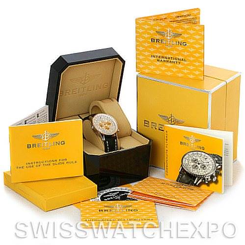 This image shows a Breitling Navitimer D22322 Men
s Stainless Steel White Dial D22322 Men
s Stainless Steel White Dial watch in its presentation box, surrounded by manuals, warranty, and packaging.